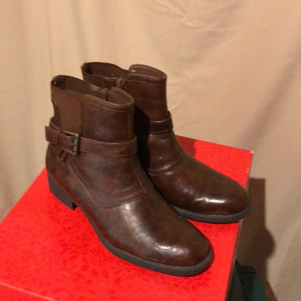 Brown ankle boots with decorative buckle